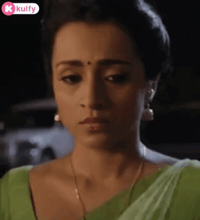 Woman In Green Saree And Earrings Close Up GIF