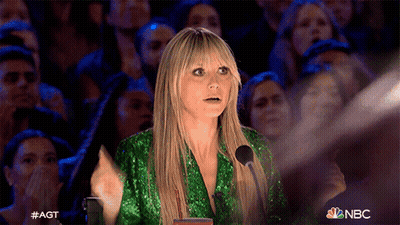 Woman In Green Sequined Dress Performing With Crowd GIF