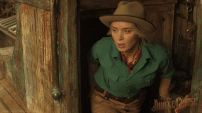 Woman In Green Shirt And Hat At Jungle Cruise Doorway GIF