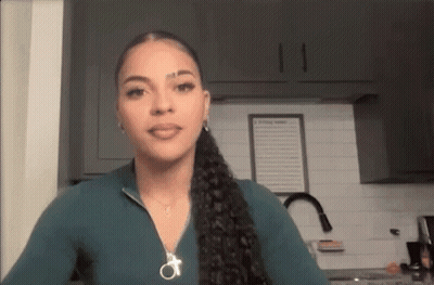 Woman In Green Shirt And Ponytail GIF
