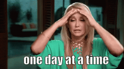 Woman In Green Shirt Holding Head One Day At A Time GIF