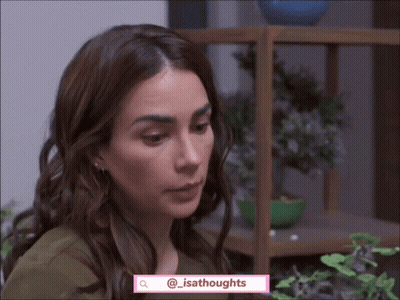 Woman In Green Shirt Looking Down At @Isathoughts GIF
