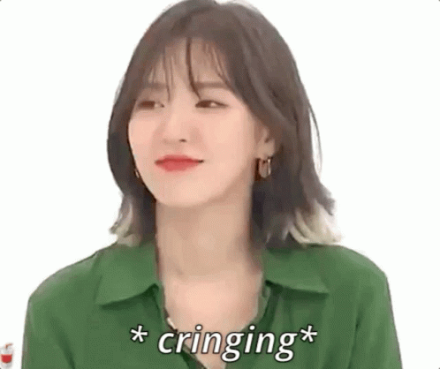 Woman In Green Shirt Making Funny Face Cringing GIF