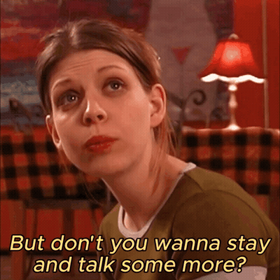 Woman In Green Shirt Saying But Don't You Wanna Stay And Talk Some More GIF