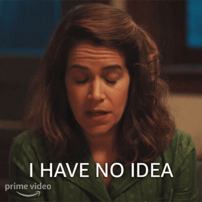 Woman In Green Shirt Saying I Have No Idea GIF