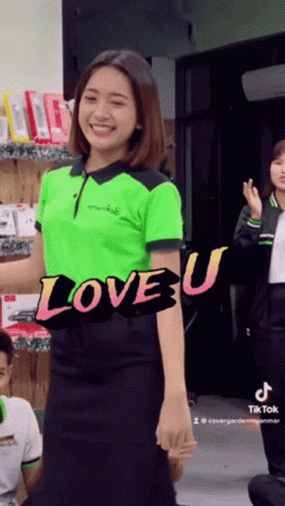 Woman In Green Shirt Saying Love U GIF