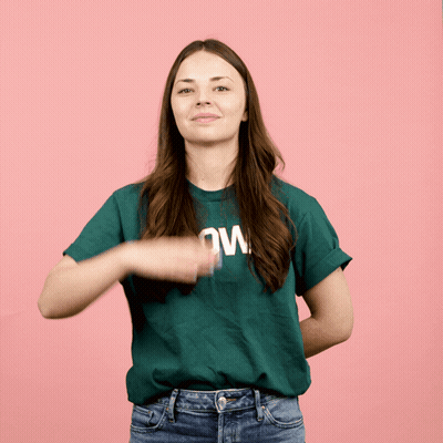 Woman In Green Shirt Saying Ow GIF