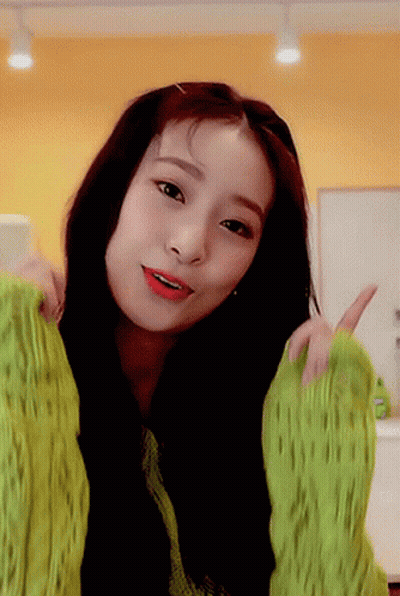 Woman In Green Sweater Giving Thumbs Up GIF