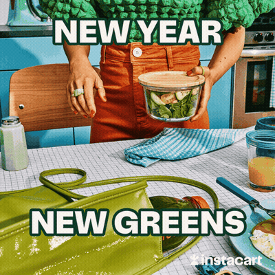 Woman In Green Sweater Holding Bowl Of Vegetables Saying New Year New Greens GIF