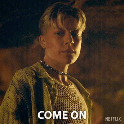 Woman In Green Sweater Saying Come On In GIF