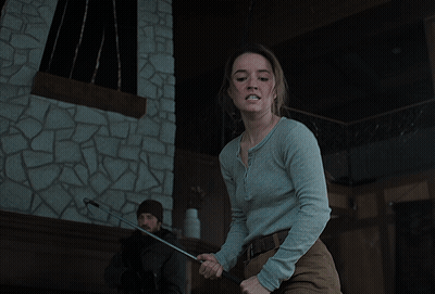 Woman In Grey Shirt Making A Face GIF