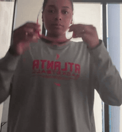 Woman In Grey Shirt Saying Atiajta GIF