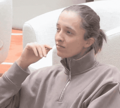 Woman In Grey Sweatshirt With Letter E GIF