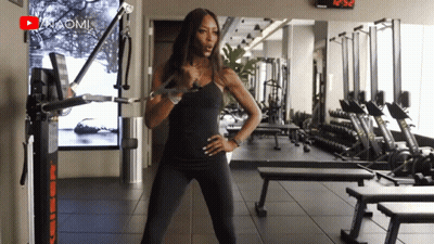 Woman In Gym With YouTube Logo GIF