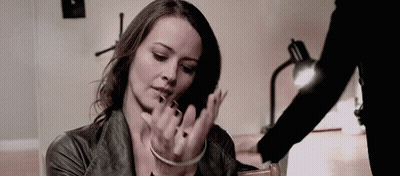 Woman In Handcuffs Being Held GIF