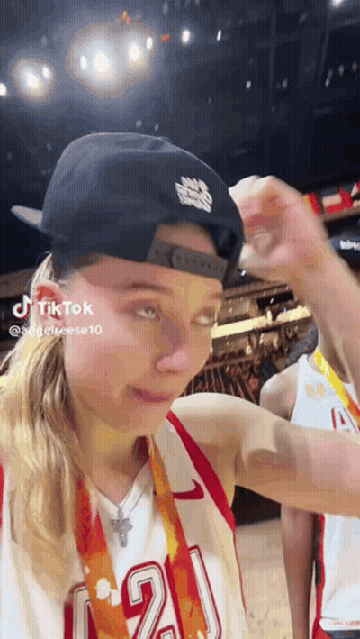 Woman In Hat And Basketball Jersey Number 20 GIF