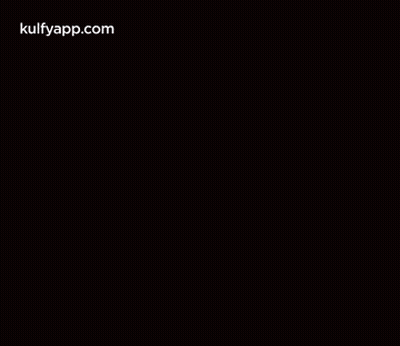 Woman In Hat And Black Shirt Hands On Chin GIF