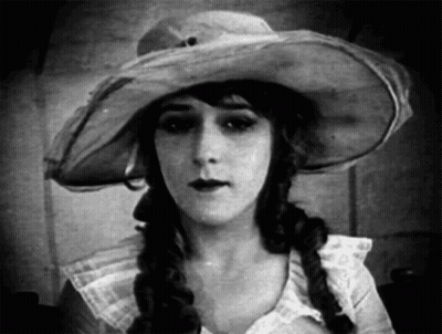 Woman In Hat And Braids Black And White GIF