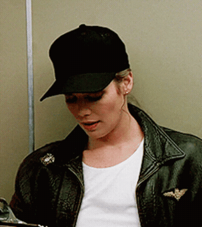 Woman In Hat And Leather Jacket GIF
