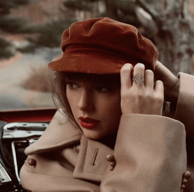 Woman In Hat And Ring Sitting In Car GIF