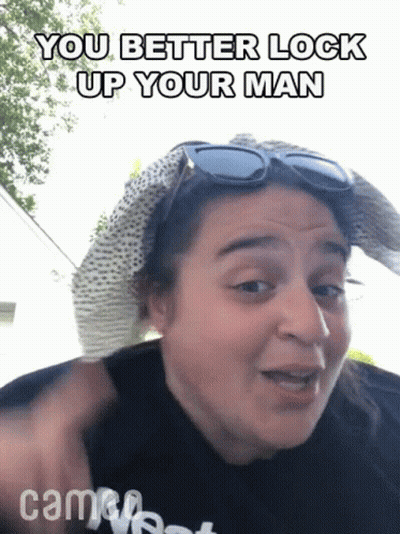 Woman In Hat And Sunglasses Saying You Better Lock Up Your Man GIF