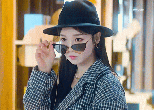 Woman In Hat And Sunglasses With Daylight GIF