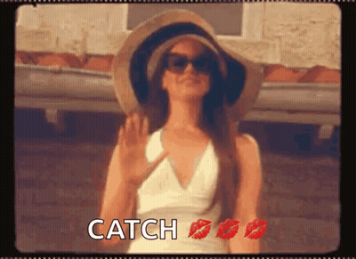 Woman In Hat And Sunglasses With Red Lipstick Says Catch GIF