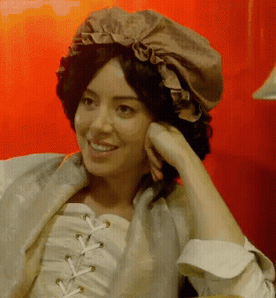 Woman In Hat And White Lace Top Smiling GIF