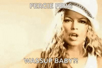 Woman In Hat And White Tank Top Talking GIF