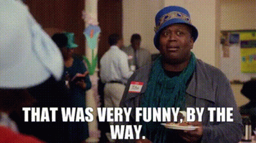 Woman In Hat Holding Food Saying That Was Very Funny GIF
