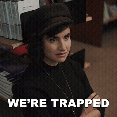 Woman In Hat Saying We're Trapped GIF
