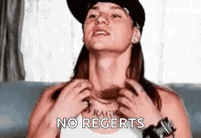Woman In Hat Scratching Neck GIF