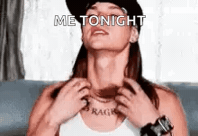 Woman In Hat Scratching Neck Saying Me Tonight GIF