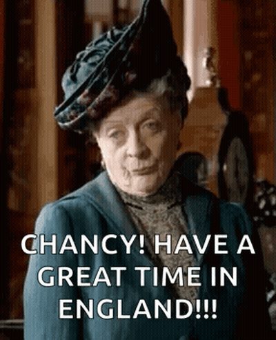 Woman In Hat Suit Says Chance In England GIF