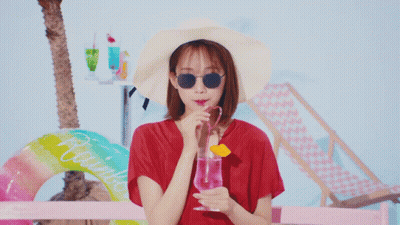 Woman In Hat Sunglasses Drinking Pink Glass GIF