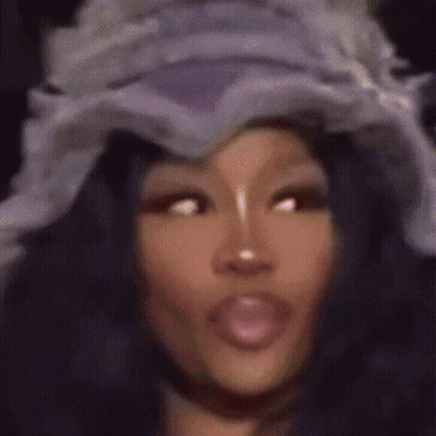 Woman In Hat With Tongue Out GIF
