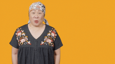 Woman In Head Scarf Making Funny Face Saying Ope GIF