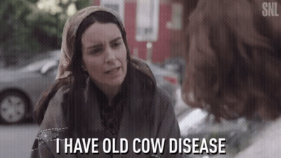 Woman In Head Scarf Saying I Have Old Cow Disease GIF