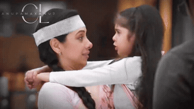 Woman In Headband Hugging Little Girl GIF