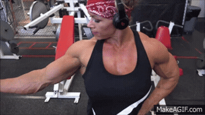 Woman In Headphones And Bandana At Gym GIF