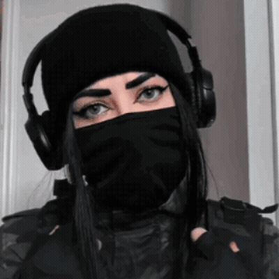 Woman In Headphones And Black Mask GIF