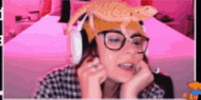 Woman In Headphones And Hat With Lizard GIF