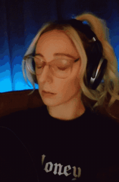 Woman In Headphones And Honey Shirt GIF