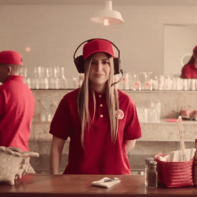 Woman In Headphones And Red Coca Cola Shirt GIF