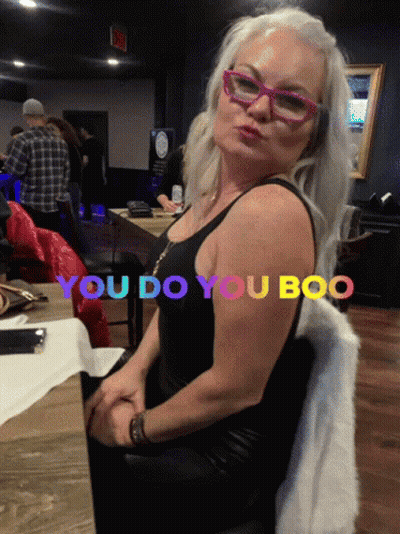 Woman In Headphones And Winnie The Pooh Hat Says You Got To Go Boo GIF
