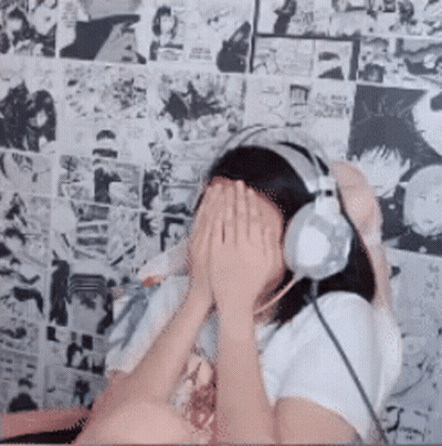 Woman In Headphones Covering Face GIF