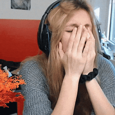 Woman In Headphones Covering Mouth GIF