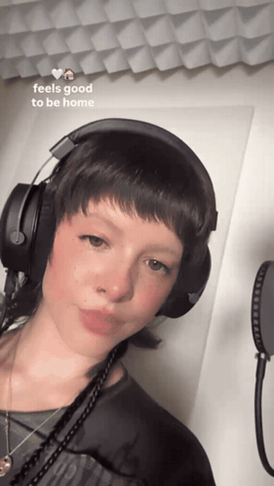 Woman In Headphones Feels Good To Be Home GIF