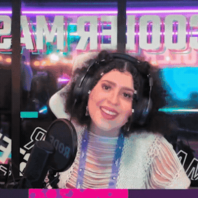 Woman In Headphones In Front Of Rode Microphone GIF