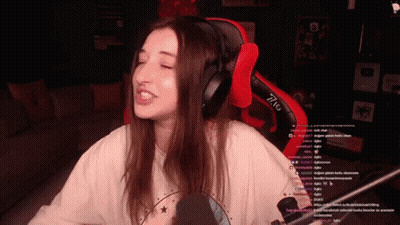 Woman In Headphones In Red And Black Gaming Chair GIF